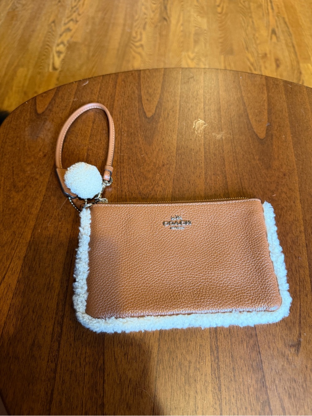 Coach Tan Pebbled Leather Wristlet with White Shearling Trim